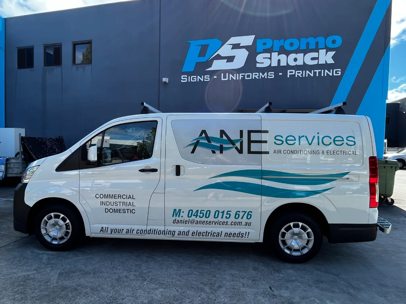 Signwritten ANE Services van outside the Promo Shack workshop at 9 Natasha Street, Capalaba